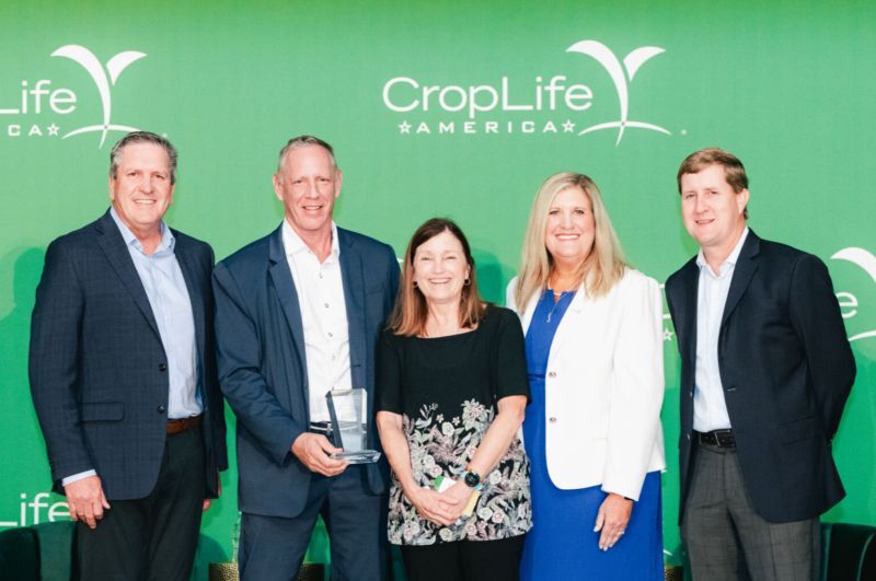 Caydee Savinelli receiving CLA career achievement award