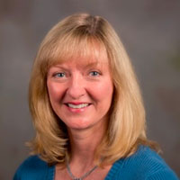 Dr. Dini Miller